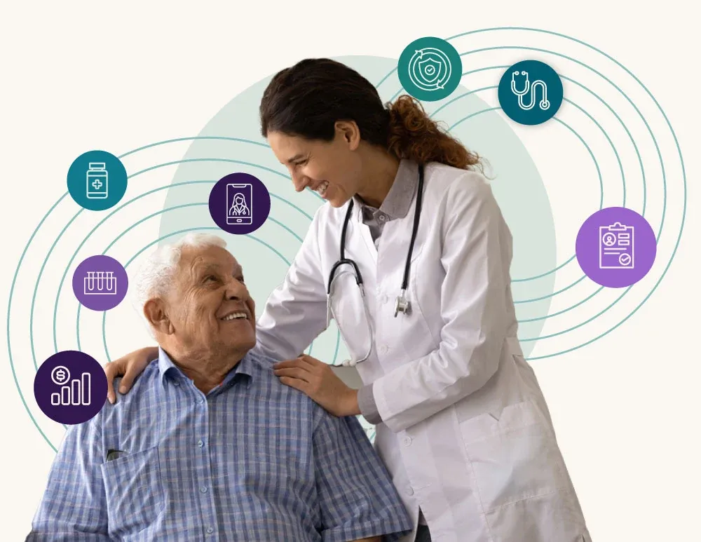 An ISHI clinician reviewing care with a patient, surrounded by monitoring and medication tools